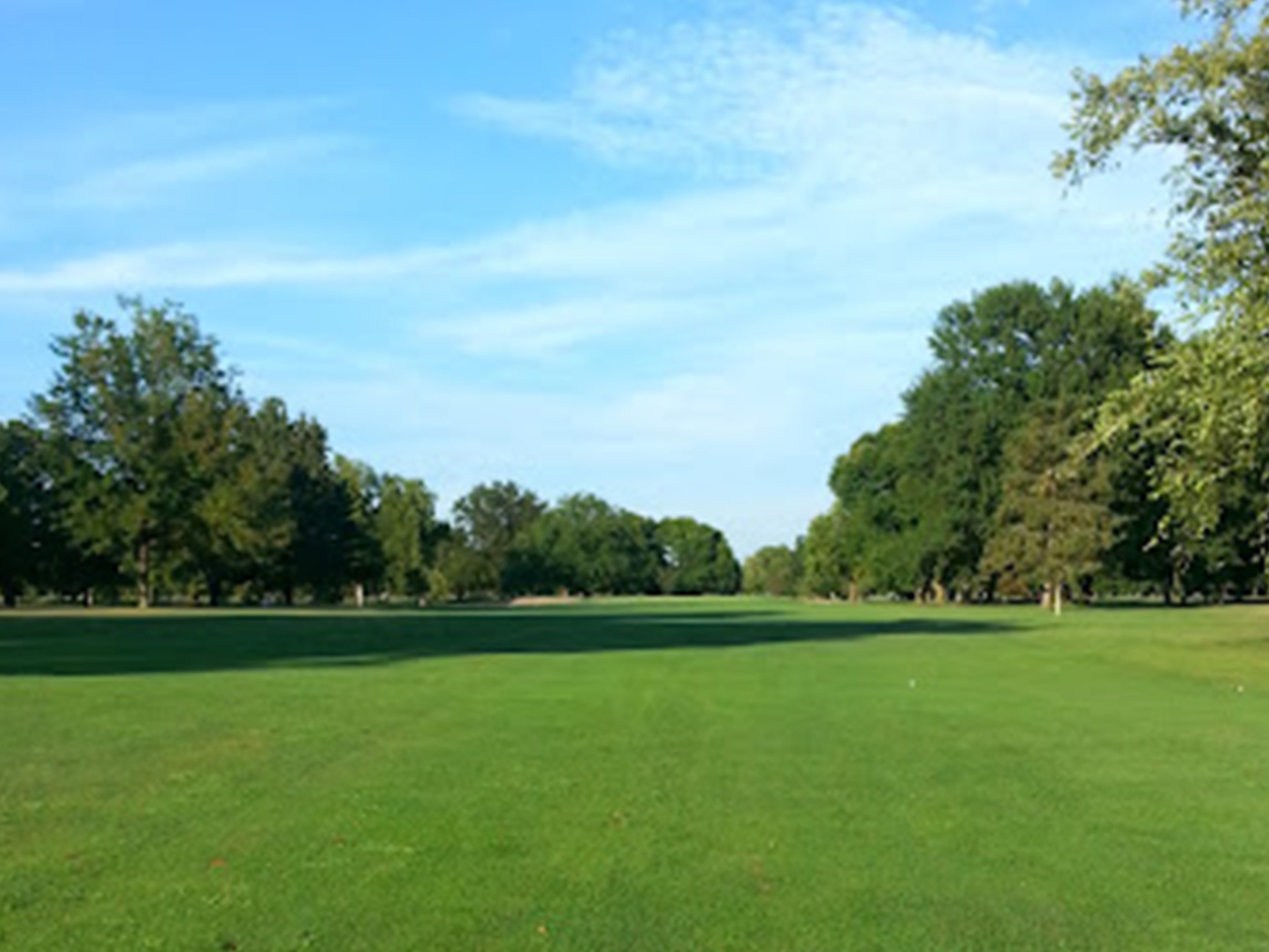 Wide landscape view of Madison Golf Course fairway