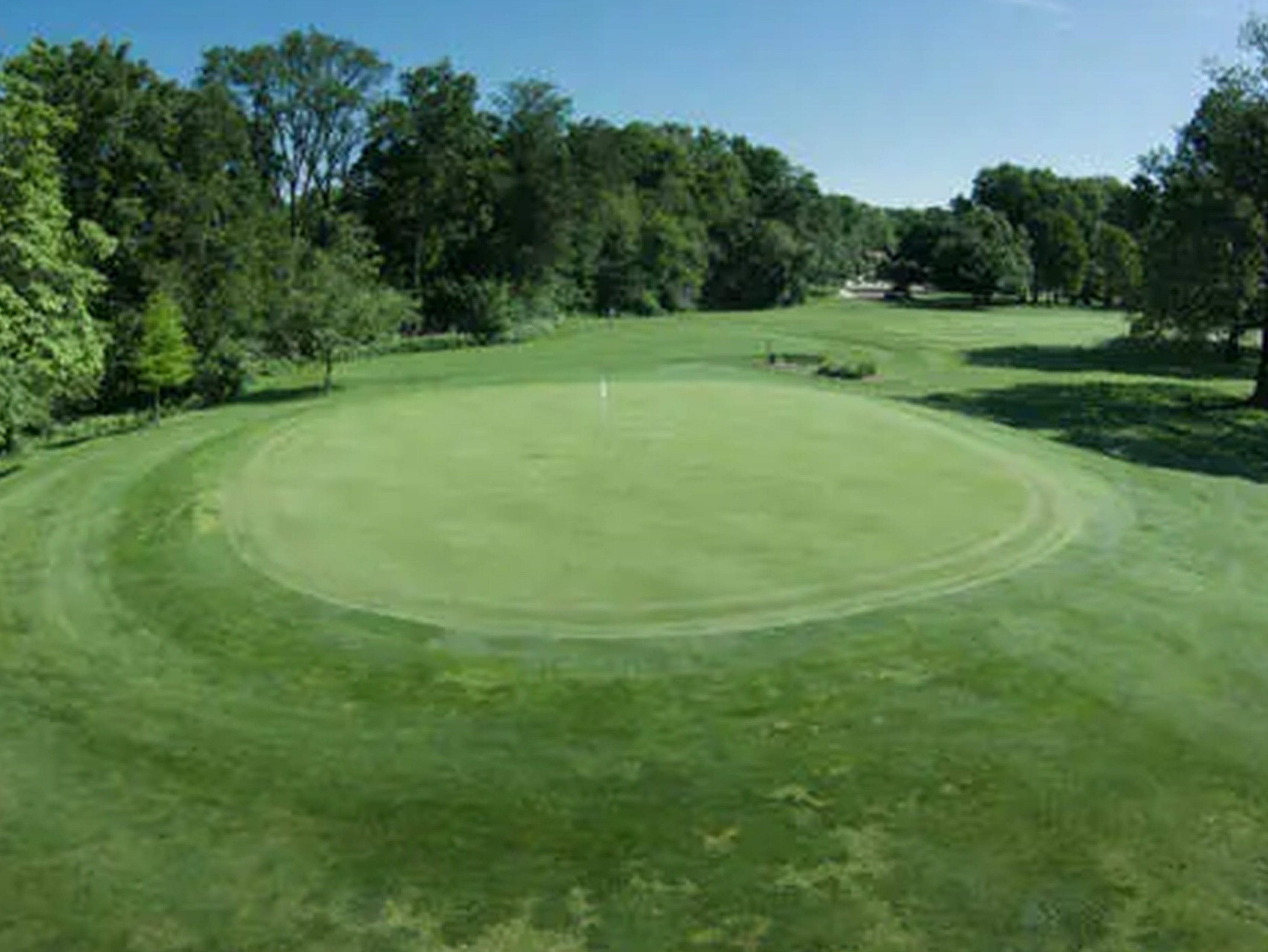 Golf hole and putting green at Madison Golf Course